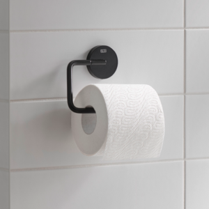 Round pappershållare med en toalettrulle.