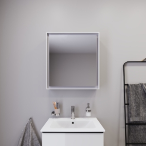 Badrum med kommod och spegelskåp i ljus nyans från Duravit och dess serie L-Cube.