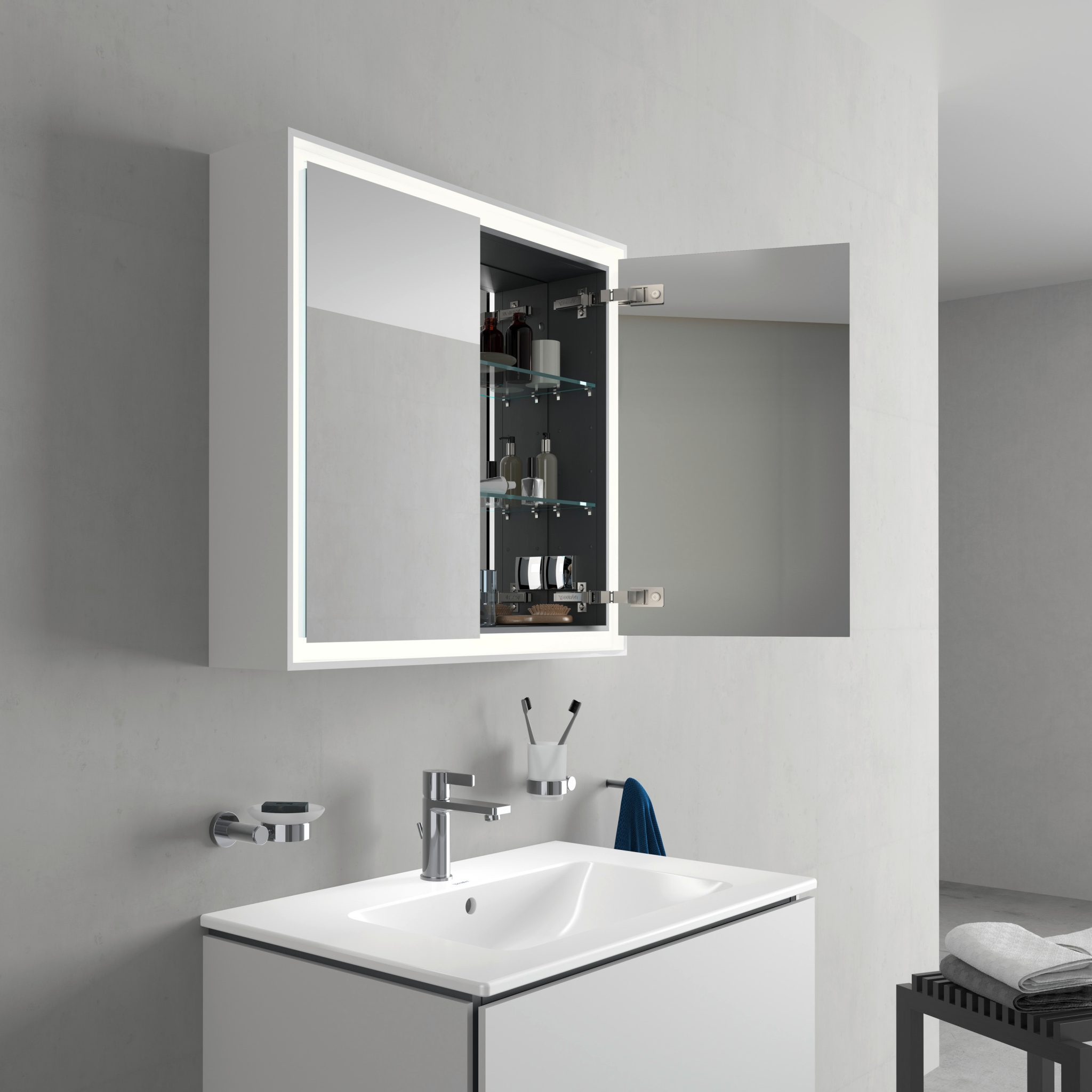 Badrum med kommod och spegelskåp i ljus nyans från Duravit och dess serie L-Cube.