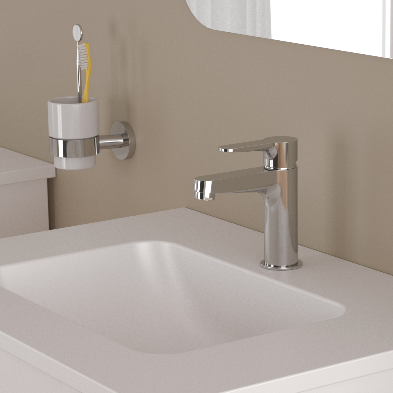 Garlate tvättställsblandare på ett tvättställ med en spegel ovanför.