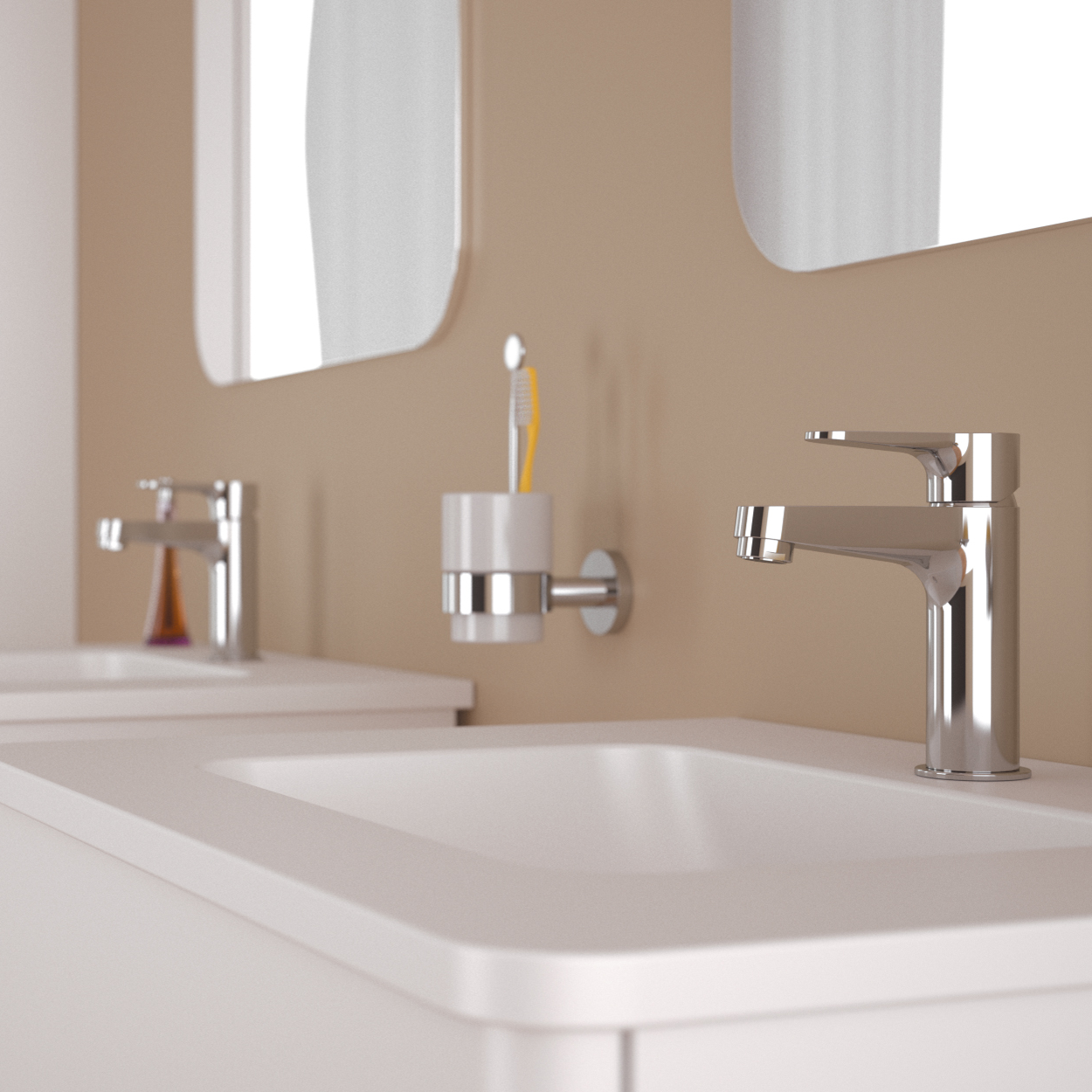 Garlate tvättställsblandare på ett tvättställ med en spegel ovanför.