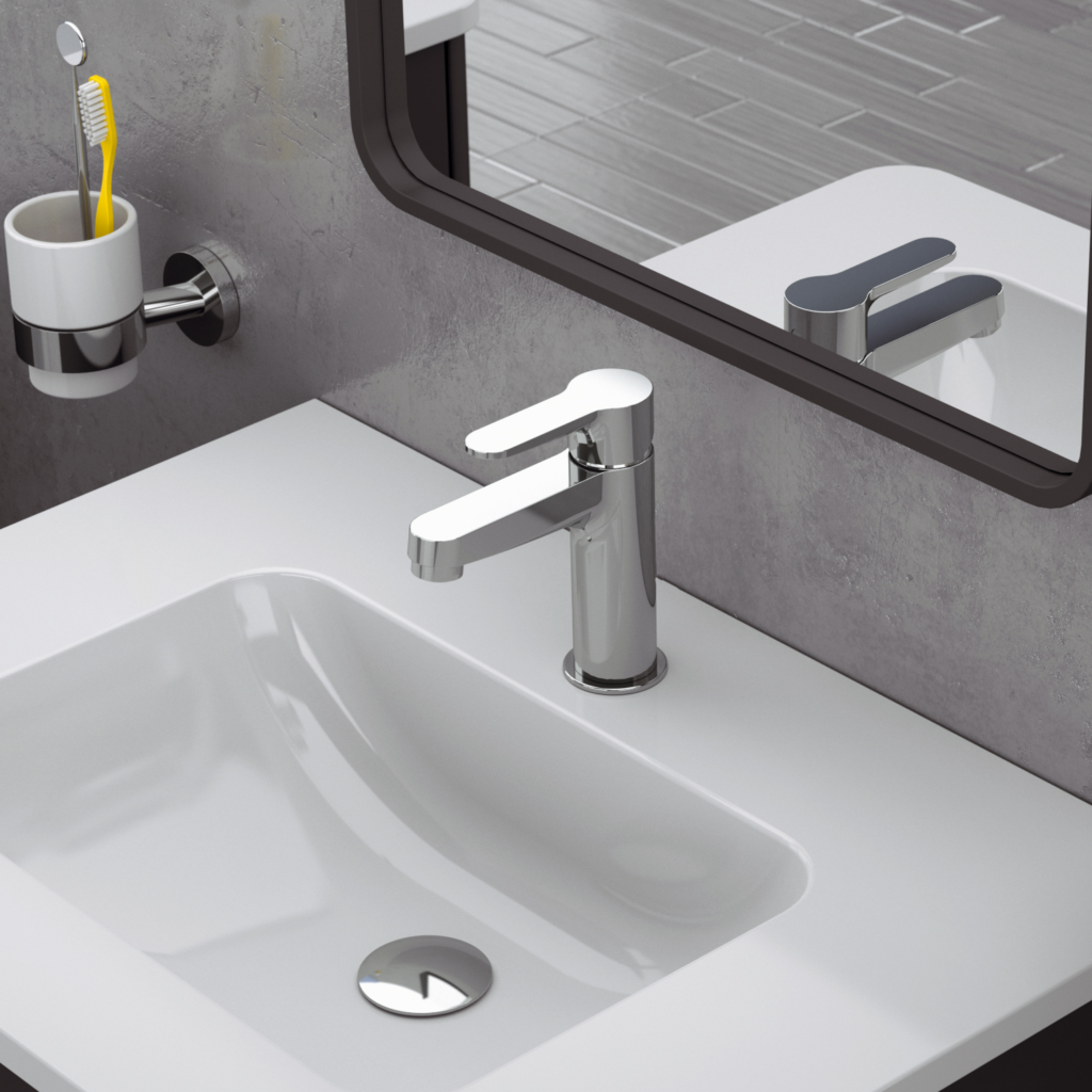 Garlate tvättställsblandare på ett tvättställ med en spegel ovanför.