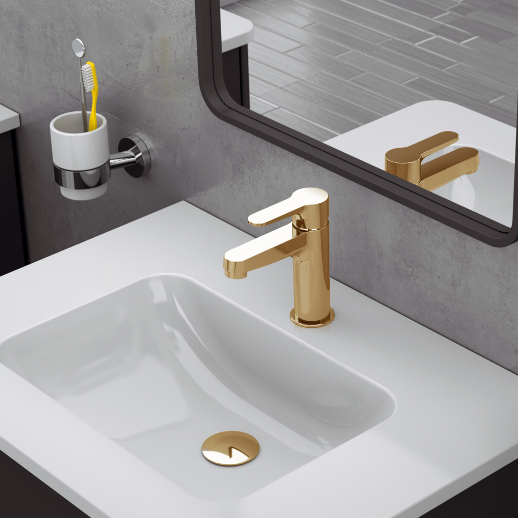 Garlate tvättställsblandare på ett tvättställ med en spegel ovanför.